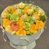Bó hoa vàng rực rỡ với hồng vàng, cẩm chướng xanh và hoa nhỏ li ti trắng, được gói trong giấy xanh bạc hà, nơ trắng - STflow