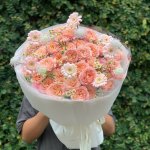 Bó hoa tươi tone hồng pastel sang trọng tại cửa hàng hoa tươi STflowers Quận 7