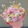 Bó hoa tươi tone hồng pastel tinh tế thiết kế bởi STflowers tại Quận 7