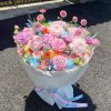 Bó hoa tươi tone hồng pastel sang trọng được thiết kế bởi shop hoa STflowers tại Quận 7